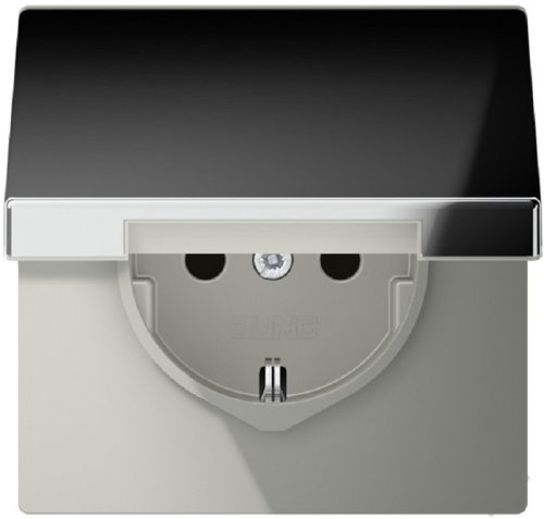 Розетка с заземлением без рамки Jung LS990 metal 1-м. крышка шторки для IP44 хром картинка